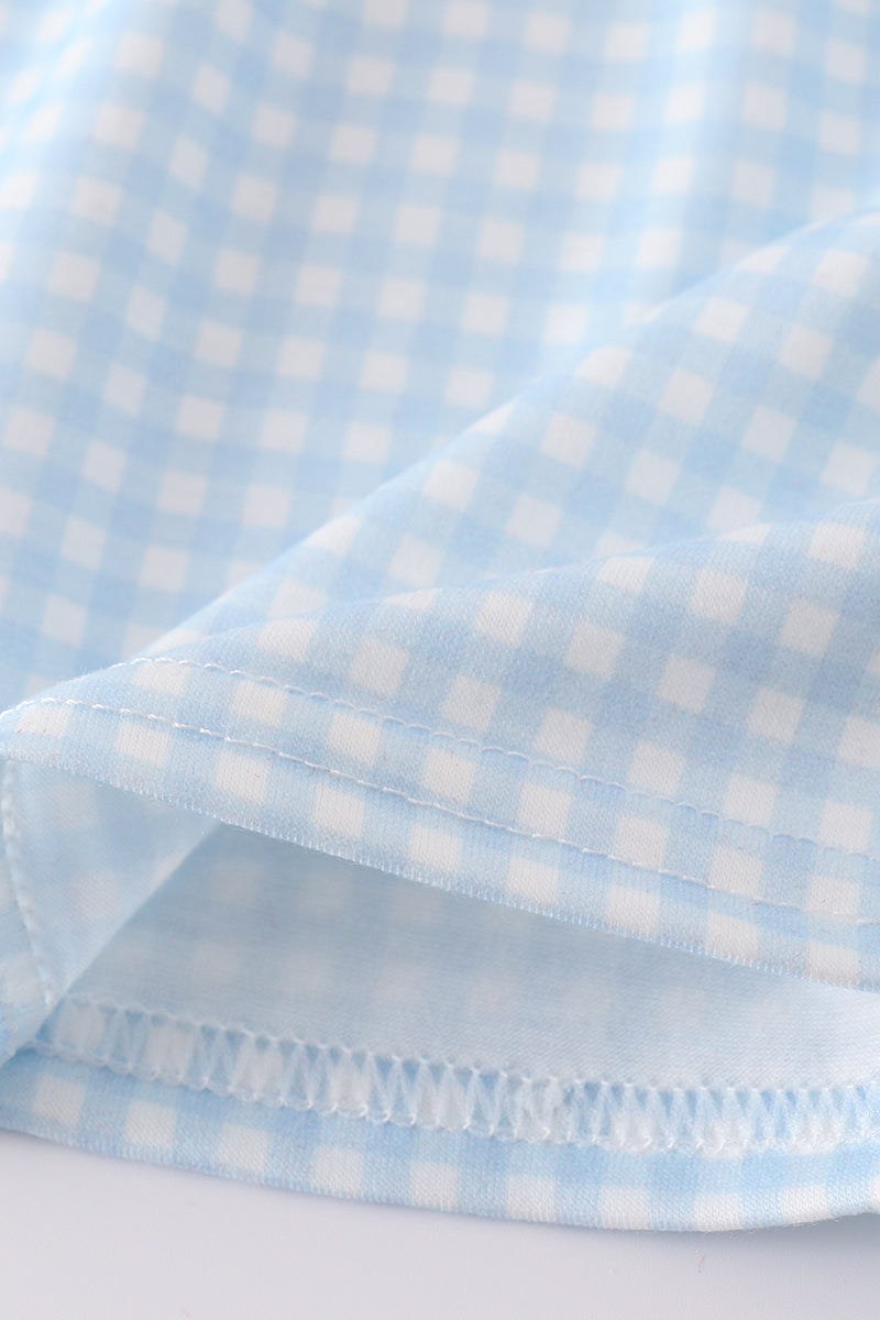 Gingham star embroidery set: blue and white checkered top and shorts with star details.
