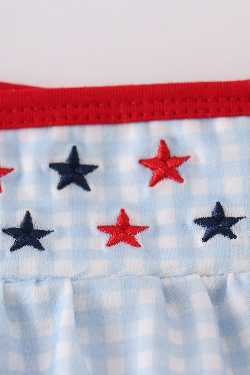 Gingham star embroidery set: blue and white checkered top and shorts with star details.