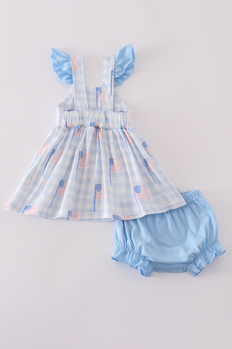 Blue gingham bloomer set with smocked flag embroidery, perfect for summer outings.