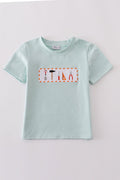 Blue embroidered top for kids with playful tool patterns, perfect for casual outings.