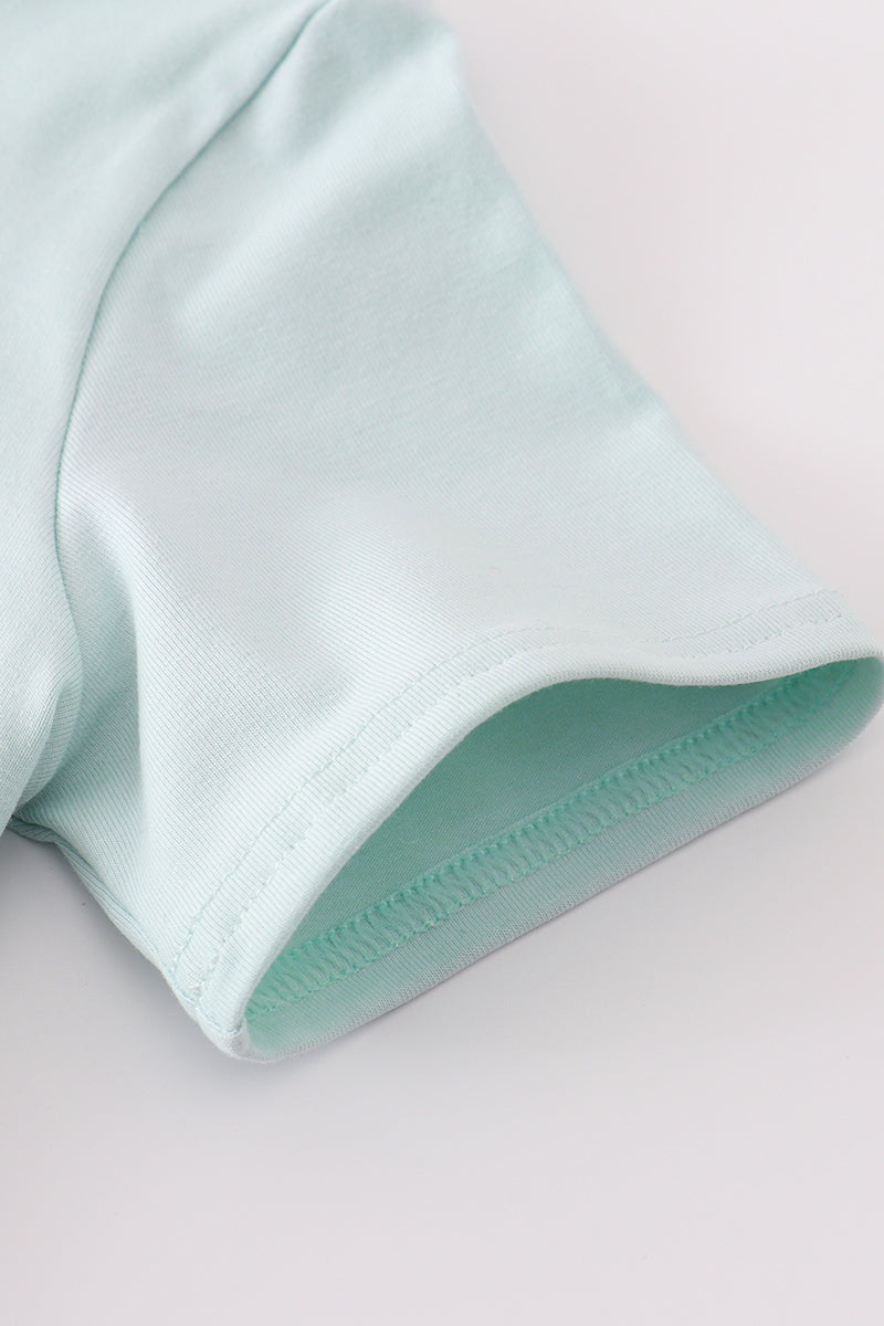 Blue embroidered top for kids with playful tool patterns, perfect for casual outings.