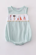 Adorable blue bubble romper with delicate tool embroidery, perfect for special occasions.