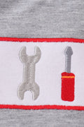 Grey tool embroidery top with playful patterns, perfect for everyday adventures.
