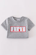 Grey tool embroidery top with playful patterns, perfect for everyday adventures.