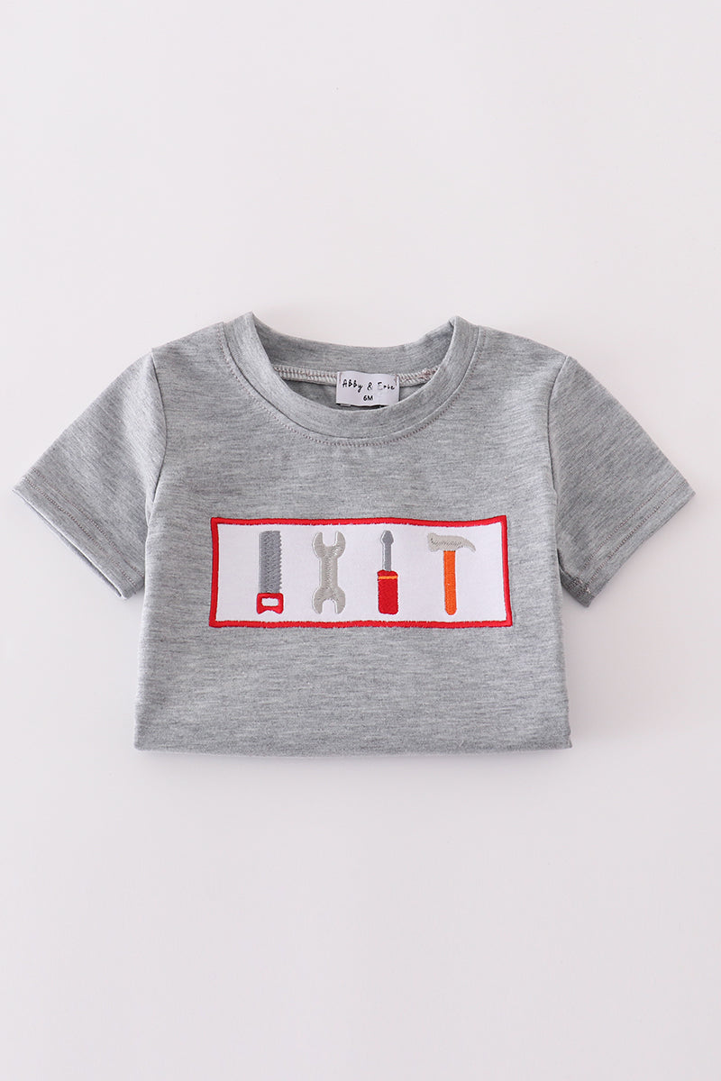 Grey tool embroidery top with playful patterns, perfect for everyday adventures.