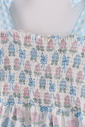 Matching blue hydrangea bow smocked dresses with delicate floral pattern for mom and child.
