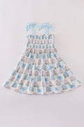 Matching blue hydrangea bow smocked dresses with delicate floral pattern for mom and child.