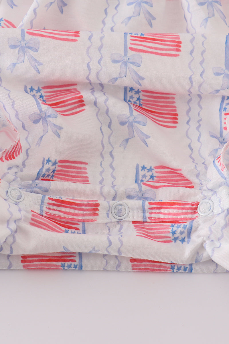 Adorable smocked bubble with bow embroidery, perfect for special occasions.