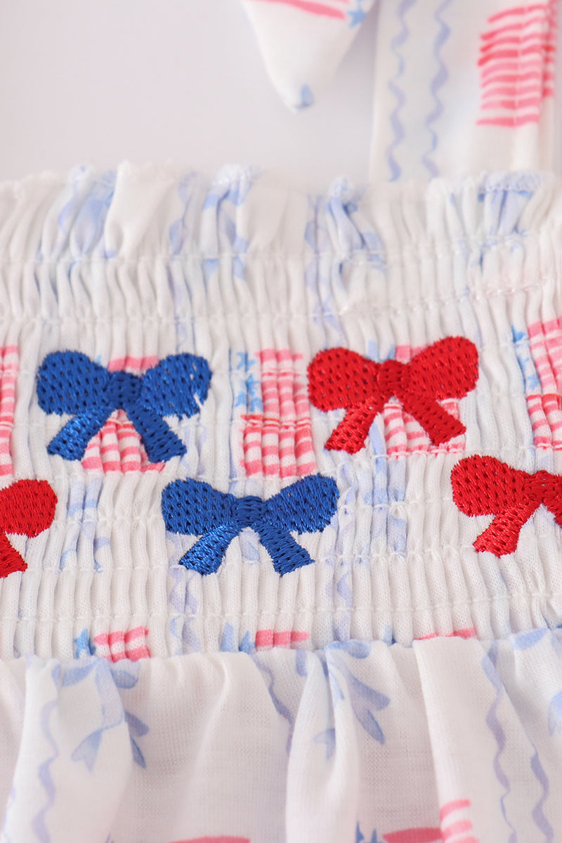 Adorable bow embroidery smocked bloomer set with pastel colors, perfect for spring outings.
