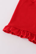 Adorable smocked shorts set with bow embroidery, perfect for playful summer days.