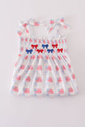 Adorable smocked shorts set with bow embroidery, perfect for playful summer days.