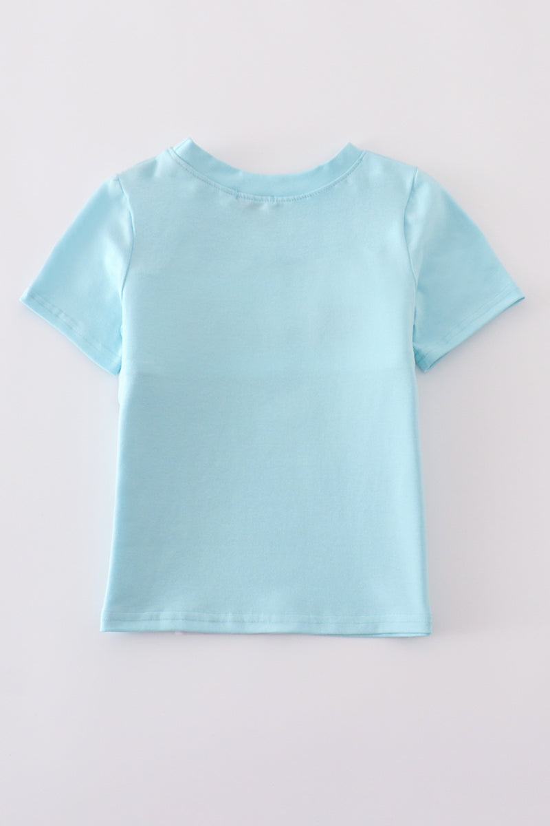 Blue smocked top with fire truck and police car embroidery for kids.