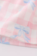 Pink plaid bow print gingham dress with flutter sleeves, perfect for spring outings.