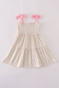 Pink lemon print smocked dress with bow, tiered design, perfect for mom and me.