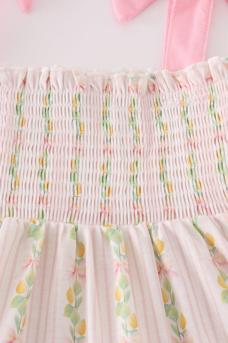 Pink lemon print smocked dress with bow, tiered design, perfect for mom and me.