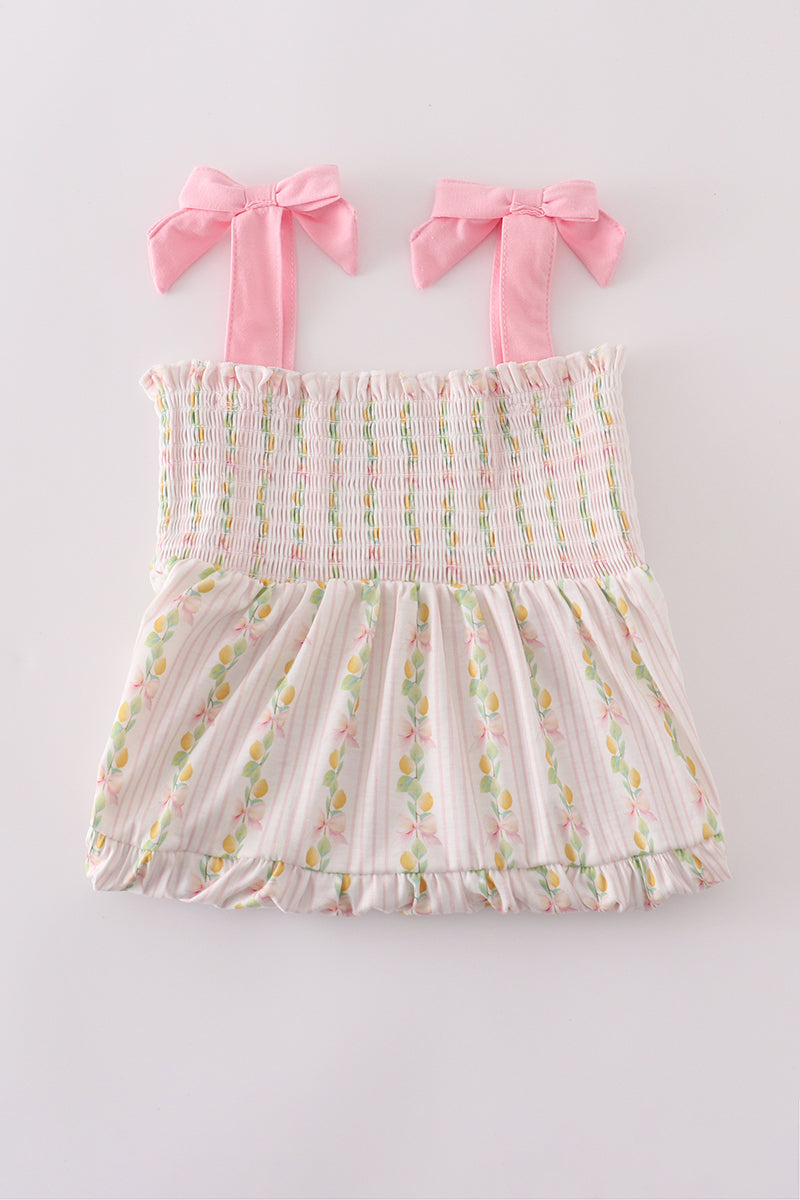 Pink lemon print smocked dress with bow, tiered design, perfect for mom and me.