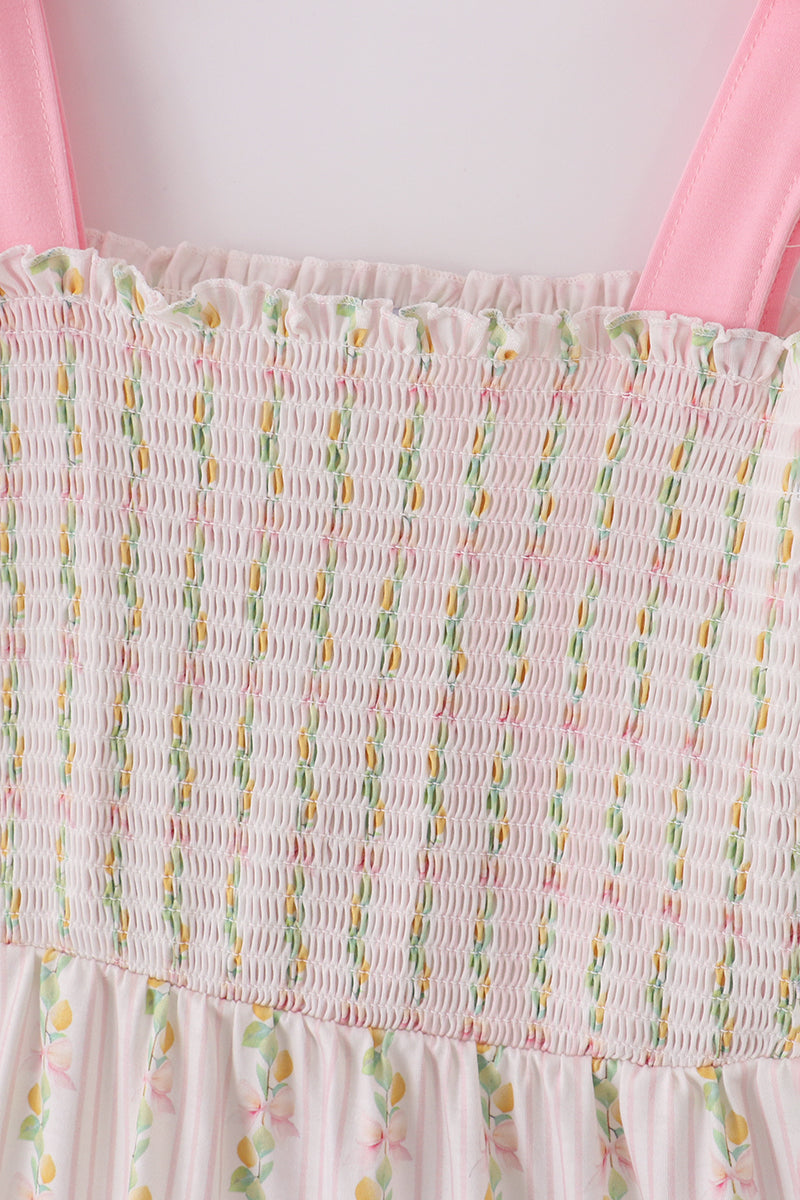 Pink lemon print smocked dress with bow, tiered design, perfect for mom and me.