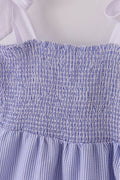 Blue stripe seersucker smocked dress with ruffled sleeves, perfect for family outings.