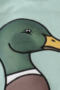 Green top with playful duck applique, perfect for kids' everyday adventures.