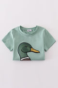 Green top with playful duck applique, perfect for kids' everyday adventures.