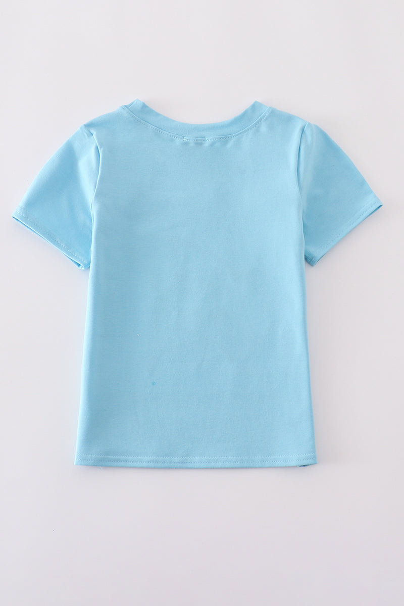 Blue fish applique top: vibrant, playful design on soft, comfy fabric for kids.