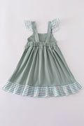 Sage green striped dress with flutter sleeves and ruffle trim, perfect for playdates.