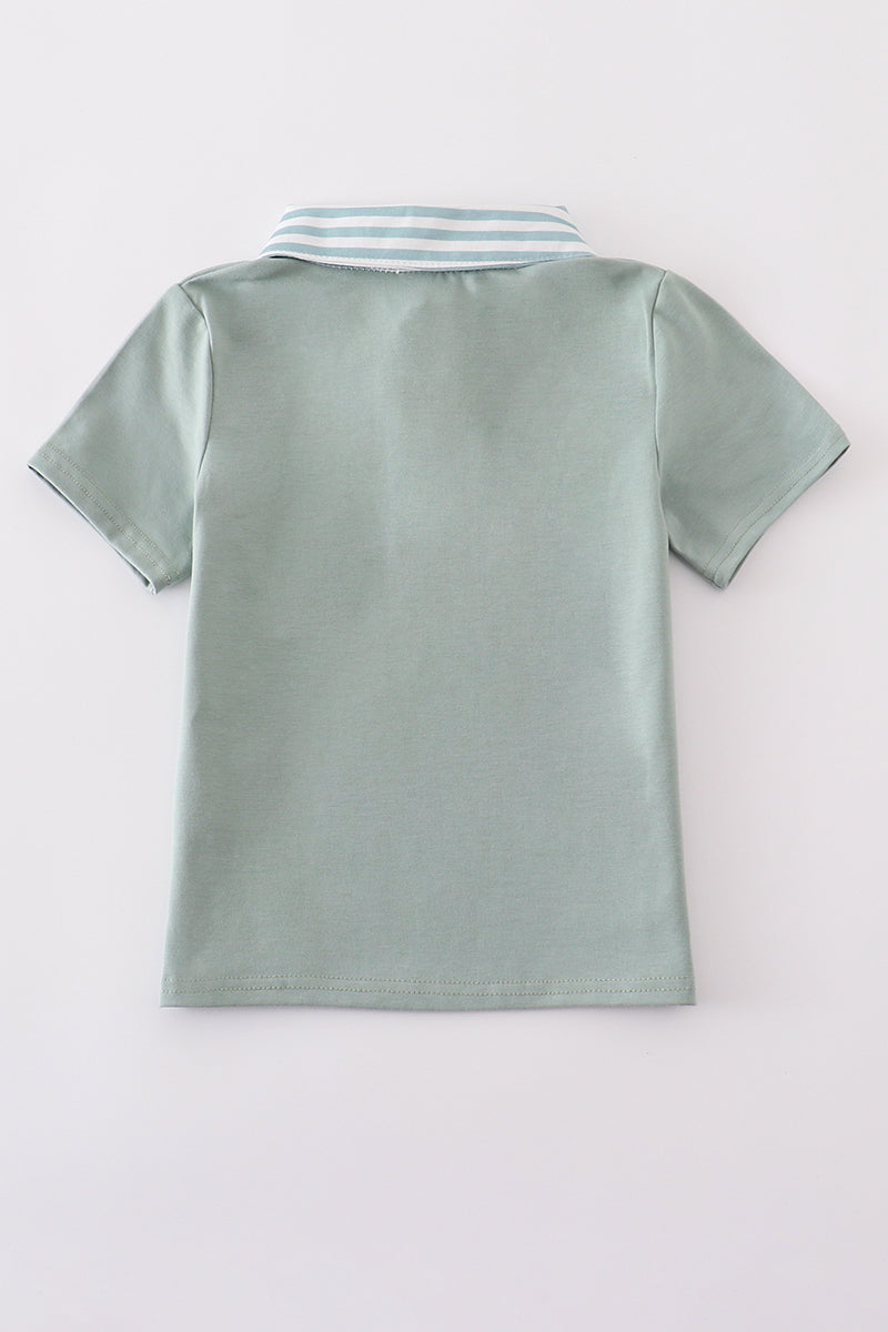 Sage stripe button down shirt with playful green and white pattern.