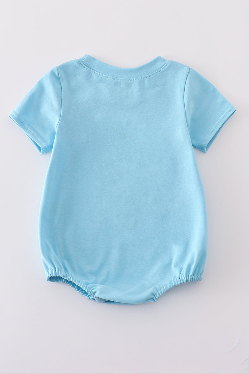 Blue fish applique bubble romper with playful aquatic design, perfect for summer fun.