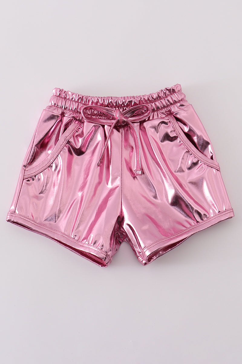 Pink laser shorts for kids with a vibrant, colorful geometric pattern.