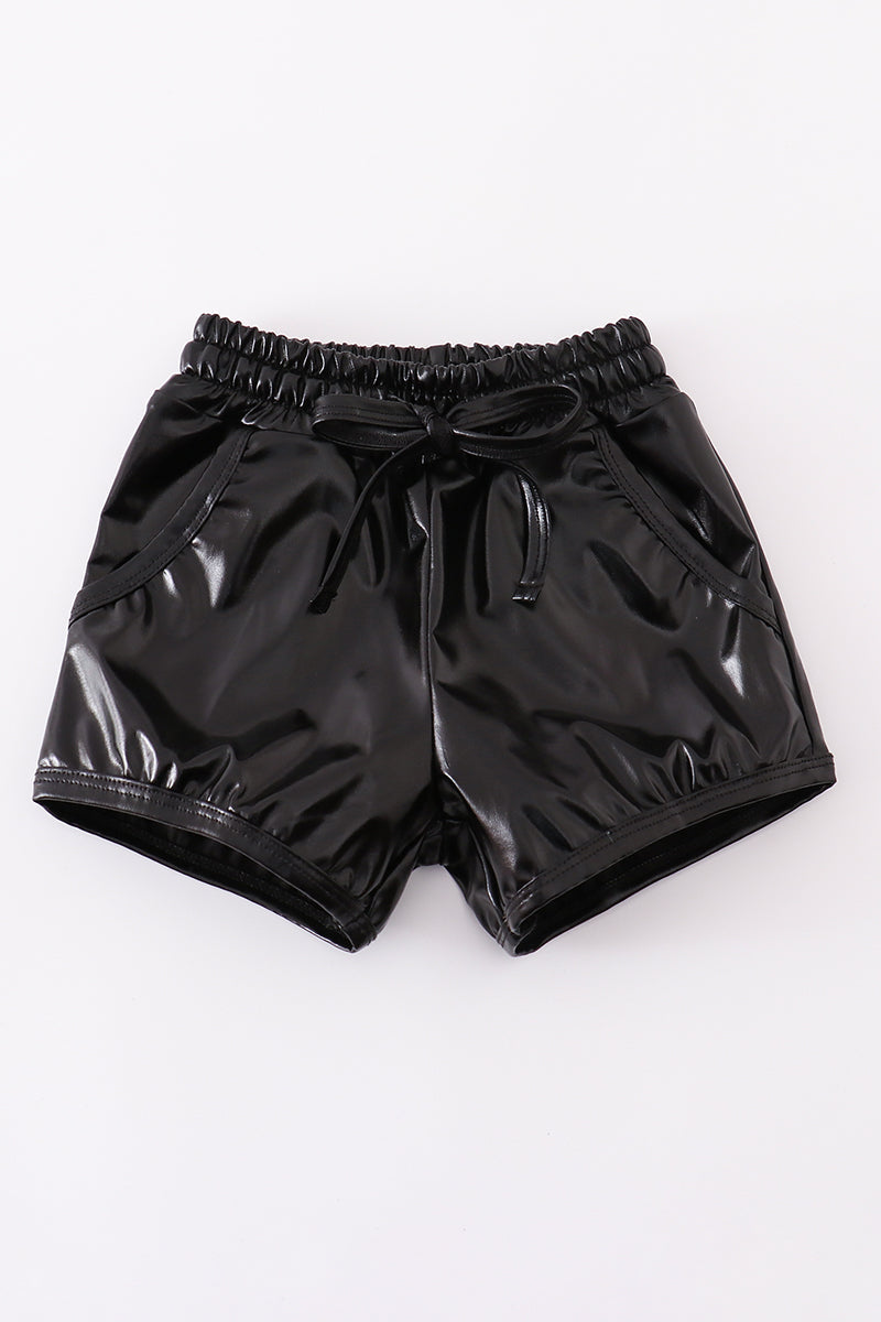 Black laser shorts with a playful, colorful laser beam pattern for kids.