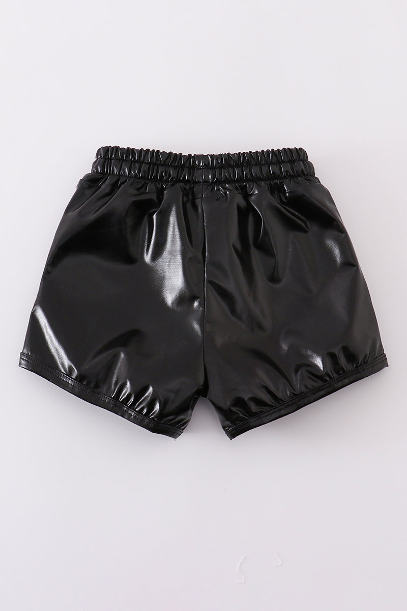 Black laser shorts with a playful, colorful laser beam pattern for kids.