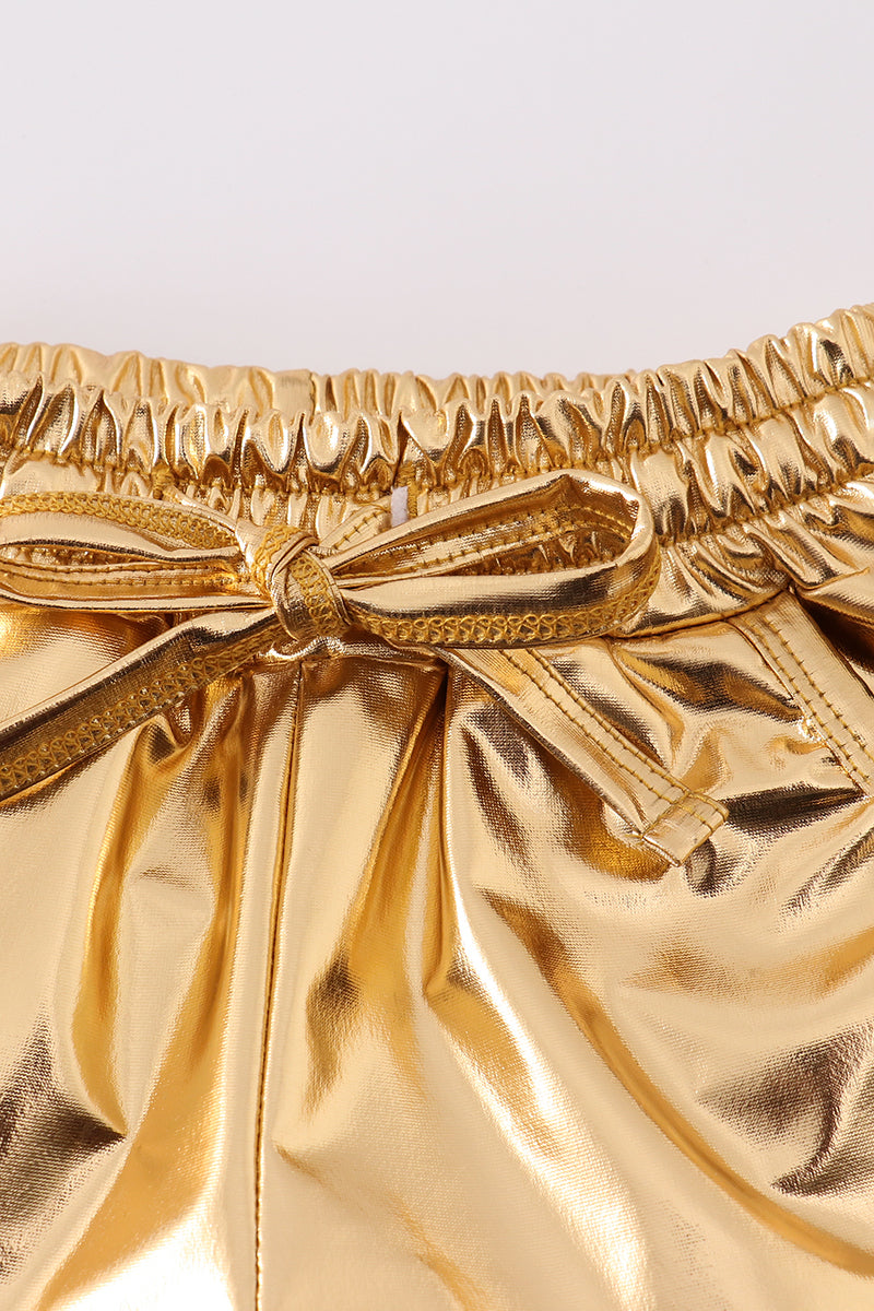 Bright yellow shorts with a playful laser pattern, perfect for sunny adventures.