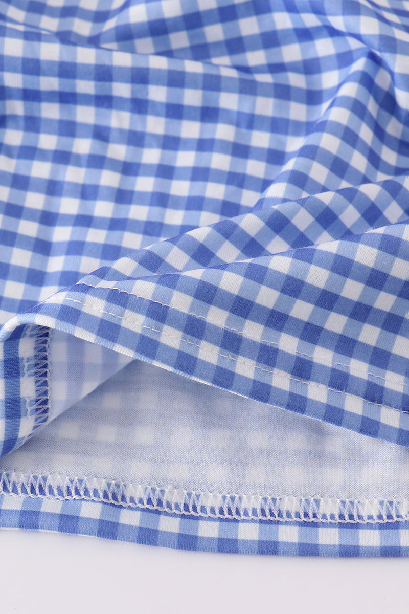 Adorable blue gingham shorts set with a playful flag bow detail.