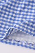 Adorable blue gingham shorts set with a playful flag bow detail.