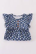 Navy dress with cheerful white daisy print, perfect for playful adventures.