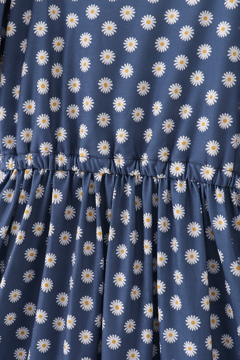 Navy dress with white daisy print, perfect for moms, casual and stylish.