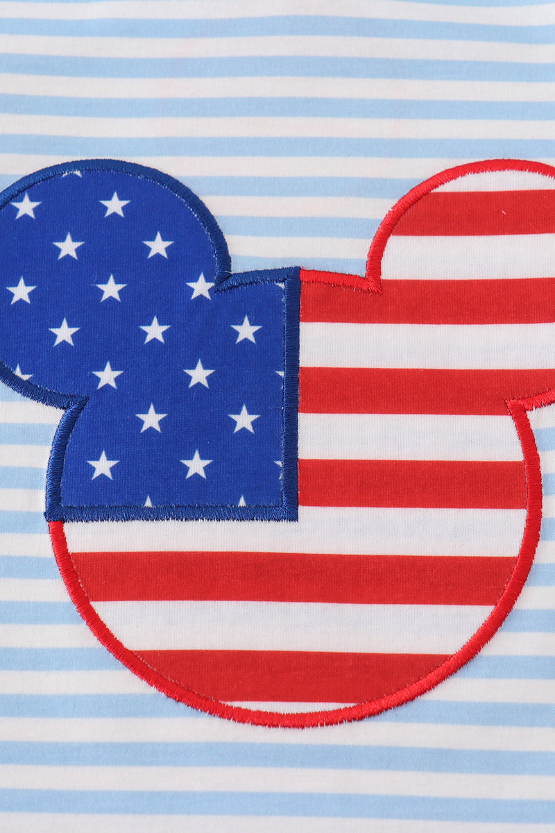 Blue and white striped top with playful character applique, perfect for kids.
