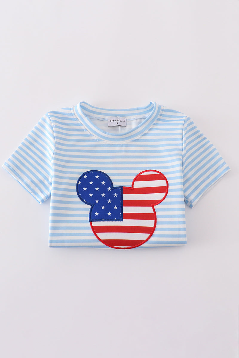 Blue and white striped top with playful character applique, perfect for kids.