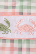 A charming plaid bloomer set featuring cheerful crab embroidery, perfect for summer fun.