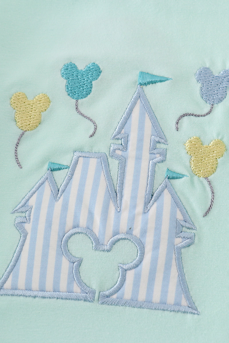 Mint green bubble romper with a whimsical castle applique, perfect for playtime.
