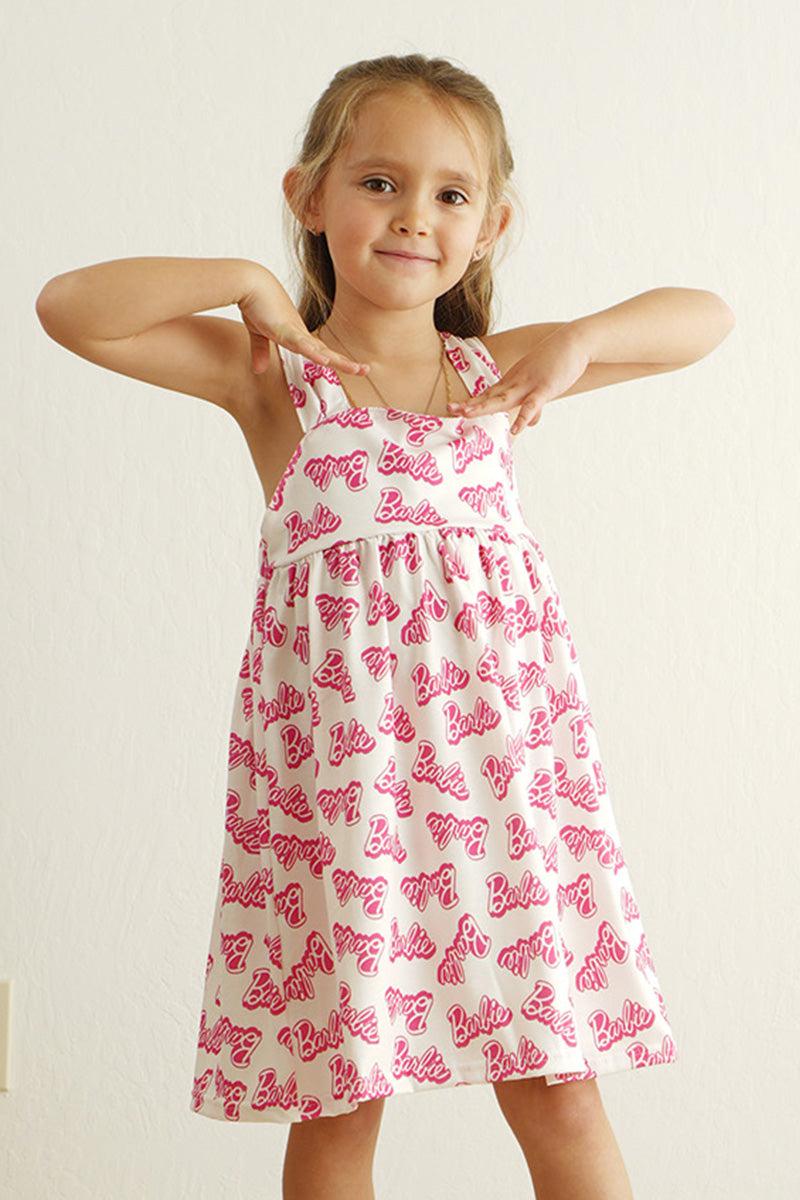 Hot pink dress with Barbie print, perfect for playful, stylish girls.