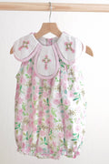 Pink bubble romper with Easter cross embroidery and floral pattern, perfect for girls.