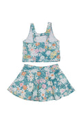Bright, floral swimsuit with daisies, perfect for sunny beach days.