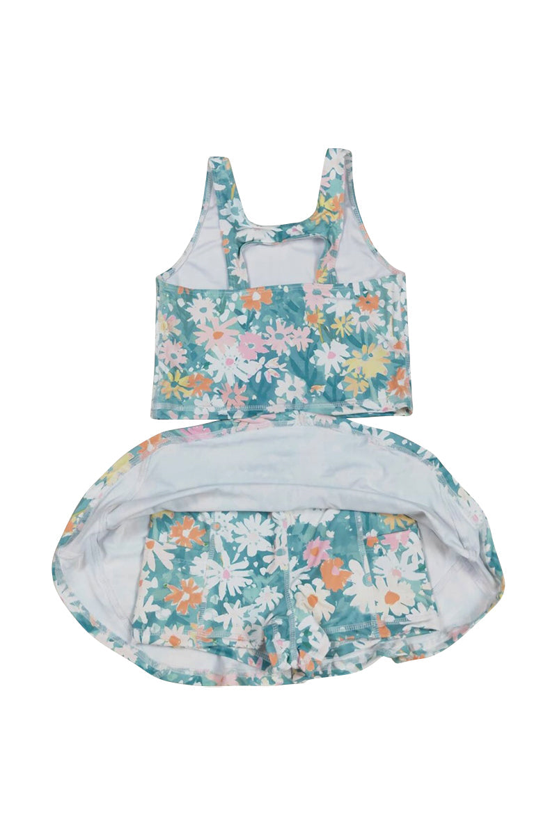 Bright, floral swimsuit with daisies, perfect for sunny beach days.