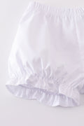 Soft, white romper with delicate cross embroidery, perfect for cozy playtime.