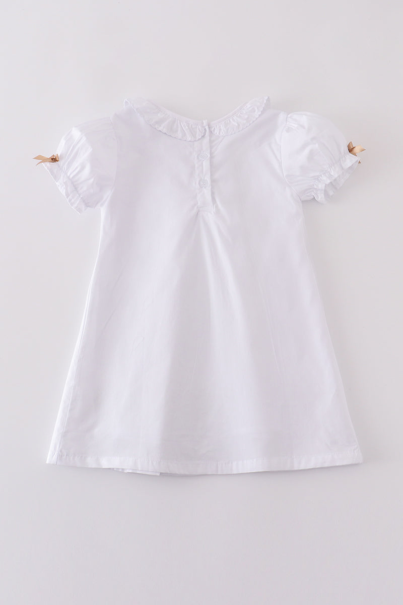 Premium cross embroidery dress in soft pastel hues, perfect for special occasions.