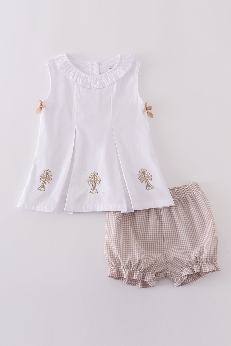 A cozy, embroidered bloomer set with cross patterns, perfect for toddlers.