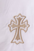 A cozy, embroidered bloomer set with cross patterns, perfect for toddlers.