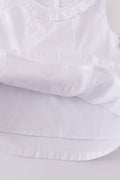 A cozy, embroidered bloomer set with cross patterns, perfect for toddlers.