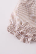 A cozy, embroidered bloomer set with cross patterns, perfect for toddlers.